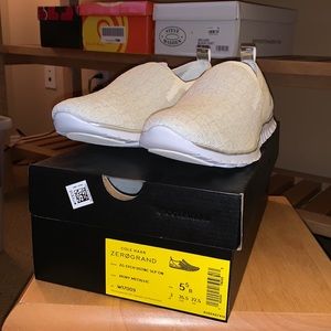 white slip-on walking sneakers